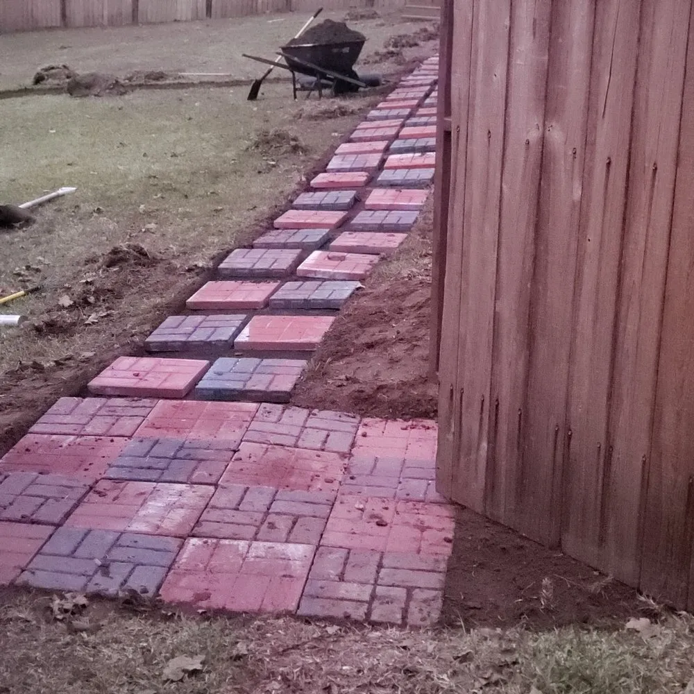 Custom landscape installation with custom design across Meridian, MS - Burton Lawn Care