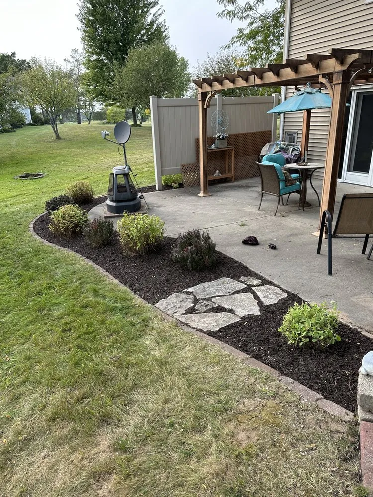 Trusted yard cleanup service for homes across Menominee, MI - Buscher Lawn and Landscape