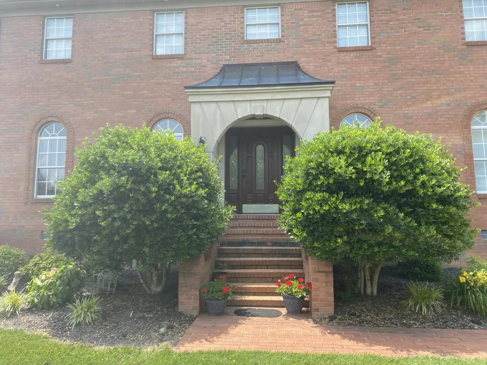 Top-rated yard cleanup service for year-round maintenance in Murray, KY by Bush Buddies