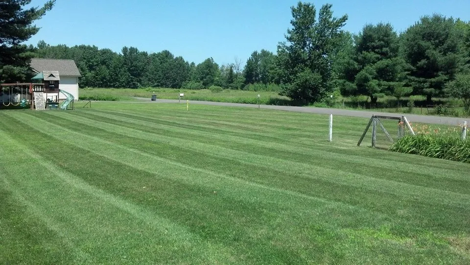 Custom residential landscaping in Whitesboro, NY by Bussonnais Lawn & Snow