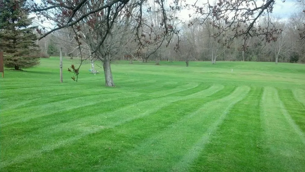 Custom garden landscaping in Whitesboro, NY by Bussonnais Lawn & Snow