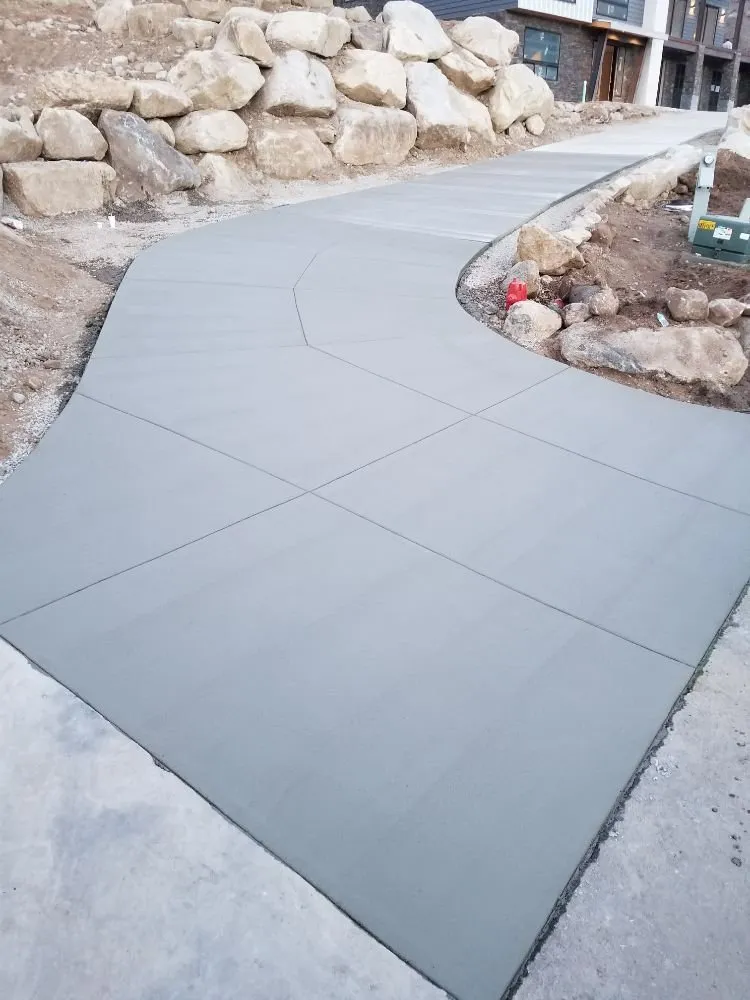 Custom lawn mowing service with custom design in Salt Lake City, UT by Busters Concrete And Landscaping