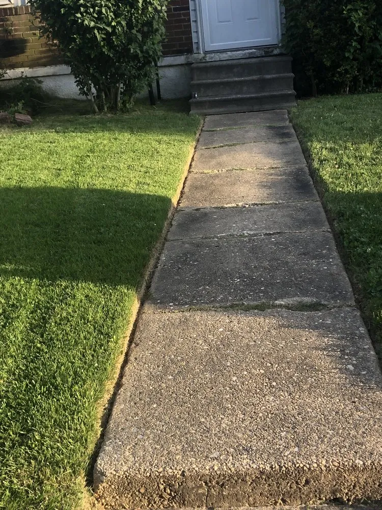 Reliable lawn mowing service for year-round maintenance in Baltimore, MD by Busy Bees Lawn Care