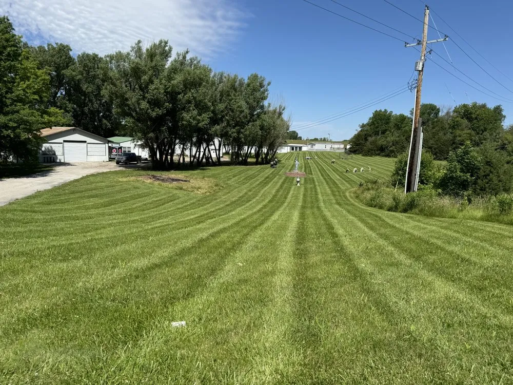 Affordable landscape installation with custom design in Savannah, MO by Butcher Lawn Care