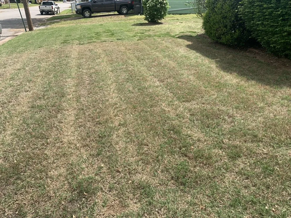 Custom landscape installation in Arkansas City, KS by Butler’s Outdoor Services