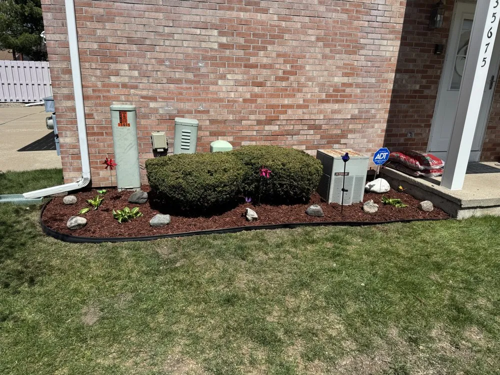Reliable yard maintenance for homes in Detroit, MI by Butta Cutz Landscaping