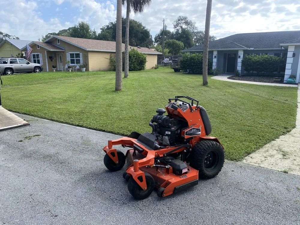 Custom lawn mowing service for beautiful yards in New Smyrna Beach, FL by Buzz Cuts Lawn and Landscaping