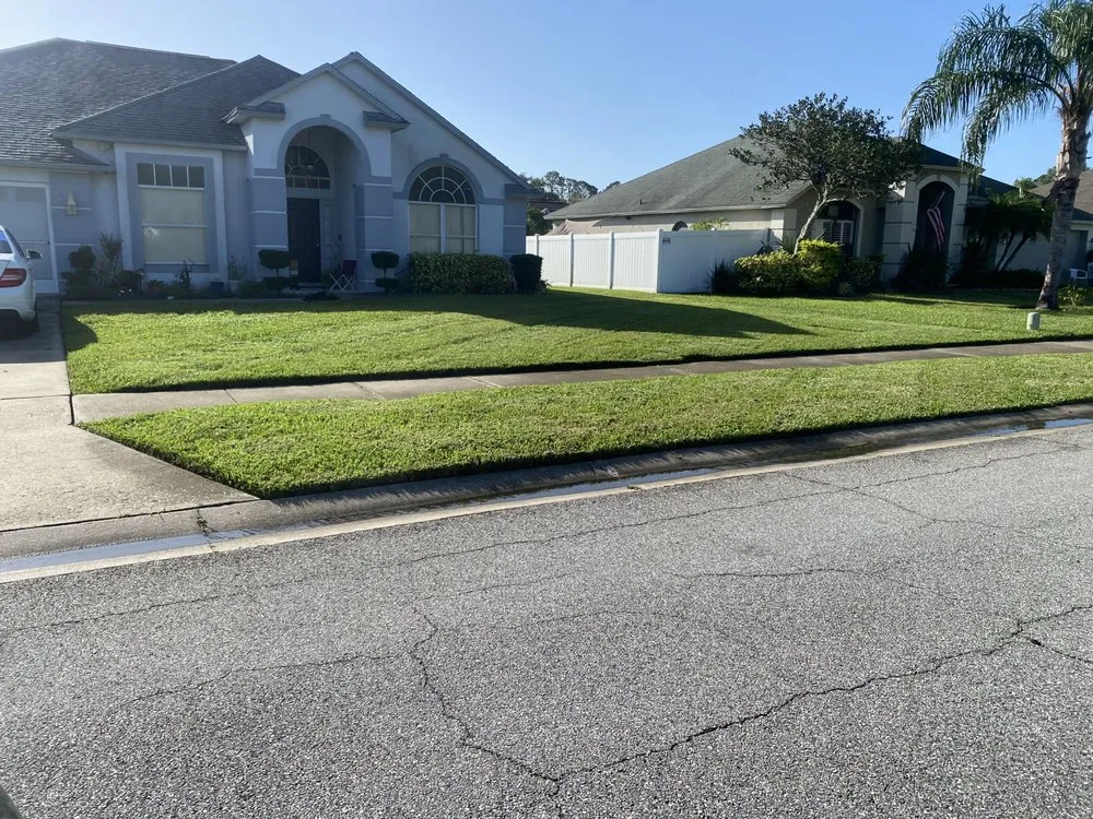 Affordable residential landscaping with custom design in New Smyrna Beach, FL by Buzz Cuts Lawn and Landscaping