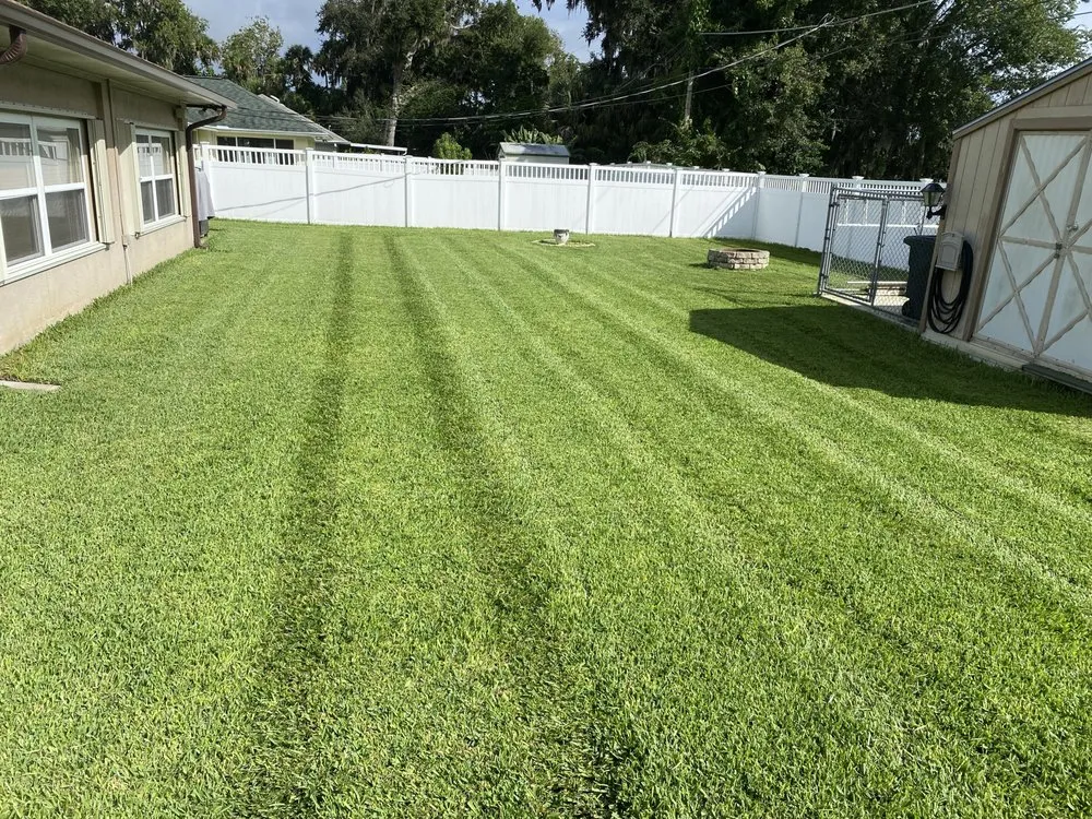 Top-rated landscape installation with custom design in New Smyrna Beach, FL by Buzz Cuts Lawn and Landscaping