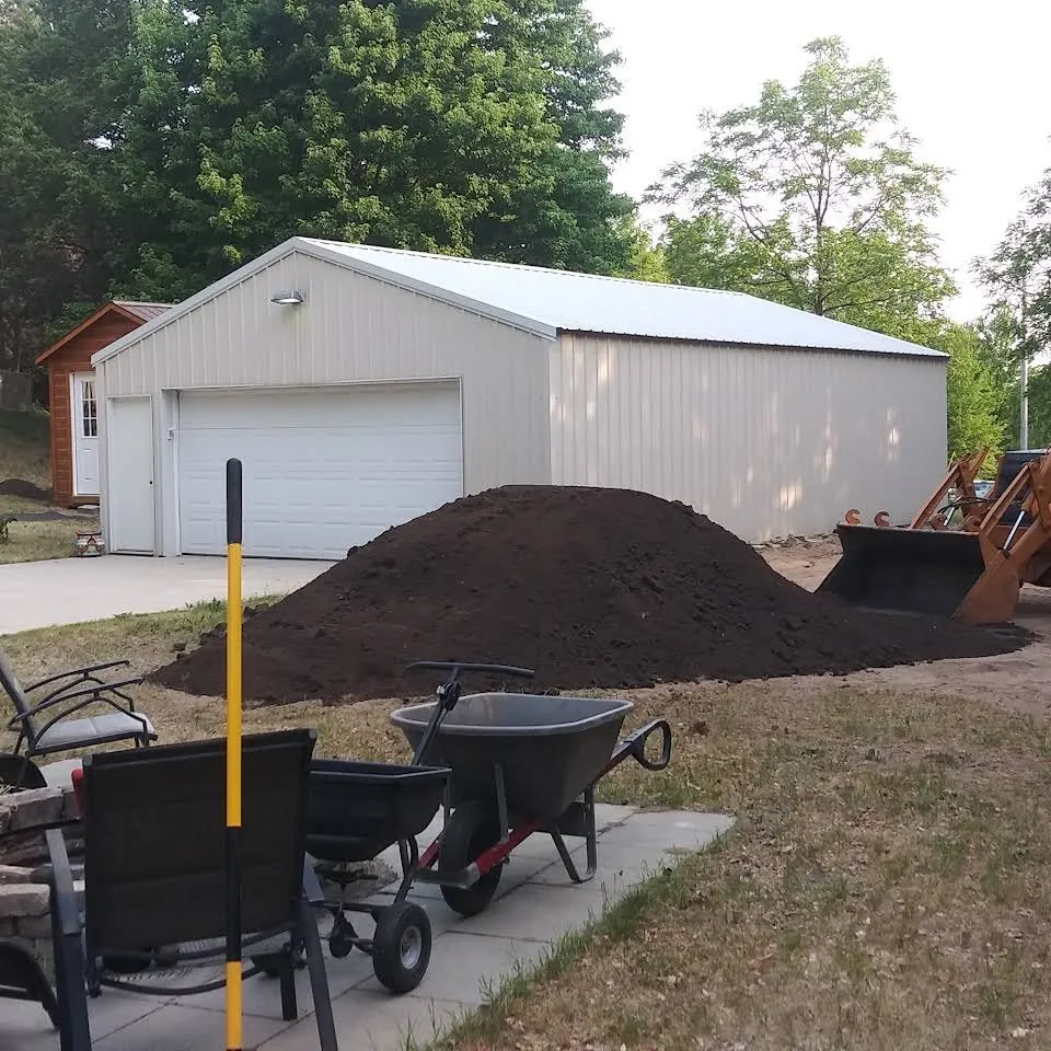 Custom yard cleanup service for year-round maintenance across Cadillac, MI - BW Land & Services