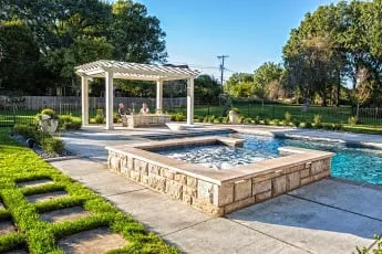 Local residential landscaping for residential properties in Parkville, MO by By the Blade Lawn & Landscape