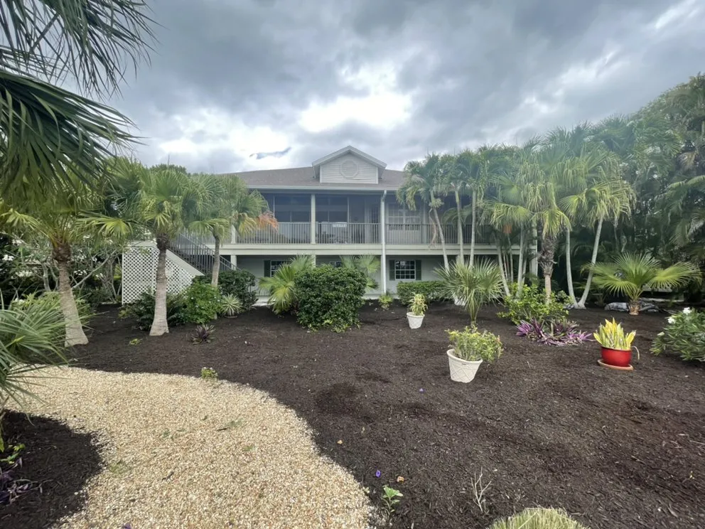 Professional yard cleanup service for beautiful yards in Sanibel, FL by By The Coast Landscaping