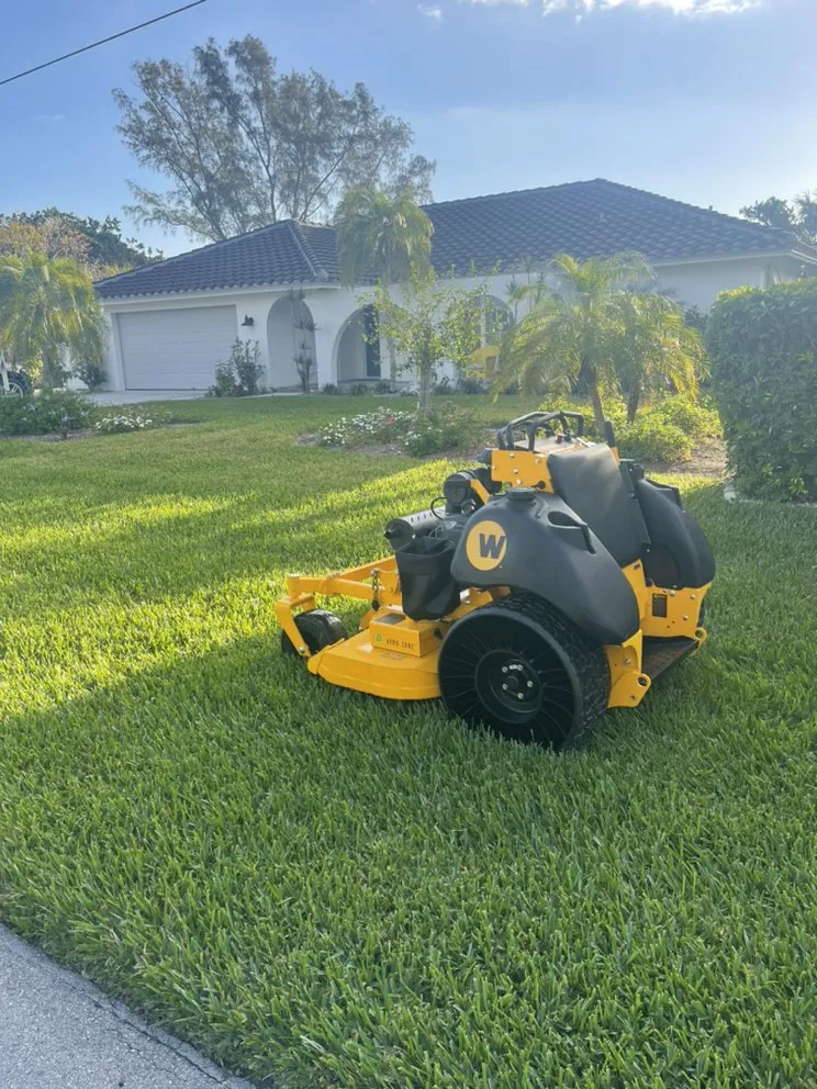 Custom lawn mowing service in Sanibel, FL by By The Coast Landscaping