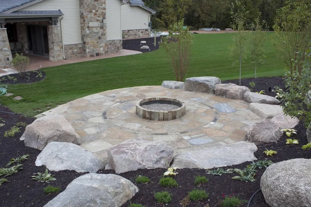 Custom garden landscaping near you in Victoria, MN by By The Woods Custom Landscaping