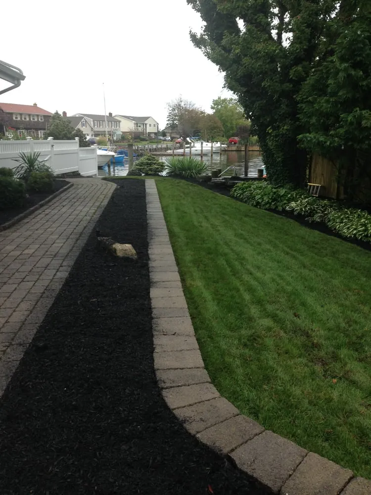Professional lawn care service with custom design across Brentwood, NY - C & A Landscaping