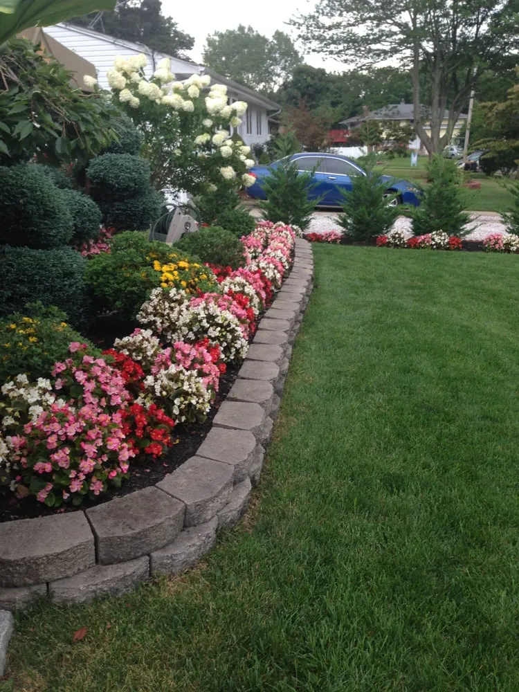 Reliable yard maintenance for residential properties in Brentwood, NY by C & A Landscaping