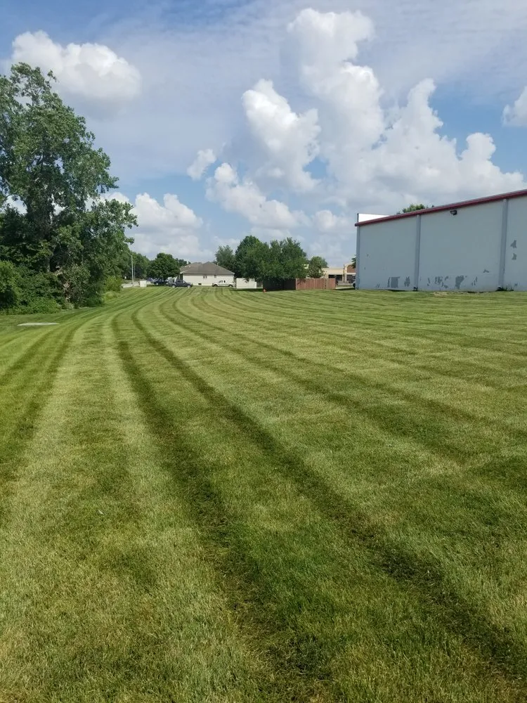 Professional outdoor landscaping experts serving Paola, KS - C & E Lawn Care