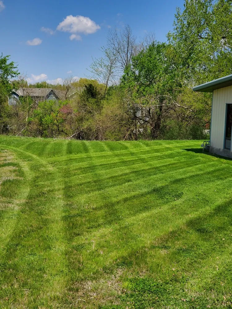 Professional landscaping services for outdoor upgrades across Paola, KS - C & E Lawn Care