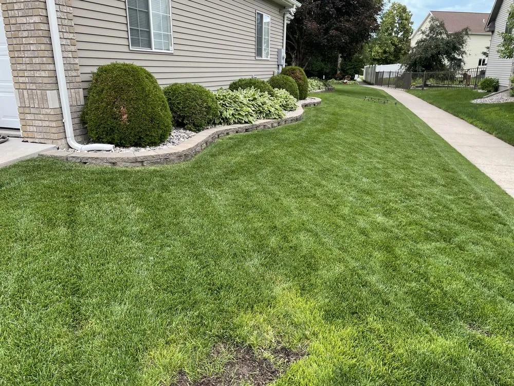 Top-rated lawn care service for year-round maintenance across Grand Forks, ND - C & L Landscapes