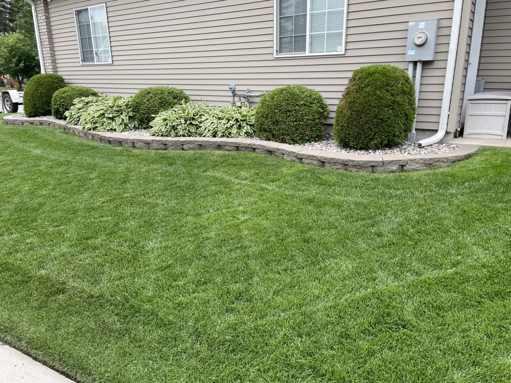 Affordable yard cleanup service for year-round maintenance in Grand Forks, ND by C & L Landscapes