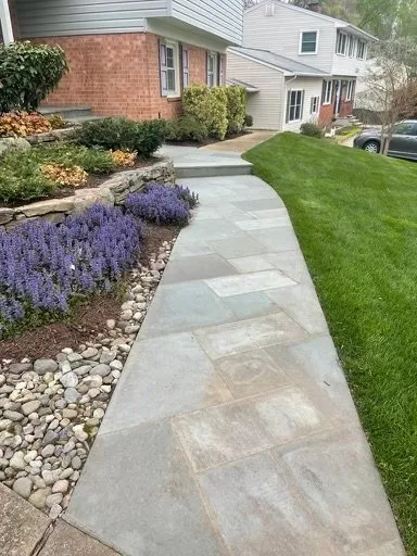 Custom landscape installation in Falls Church, VA by C & W Landscaping