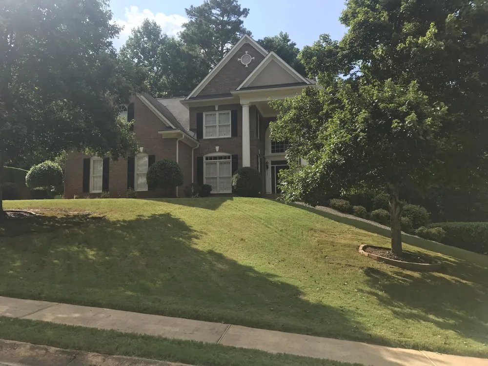 Custom lawn care service for residential properties across Fayetteville, GA - C and C Landscaping