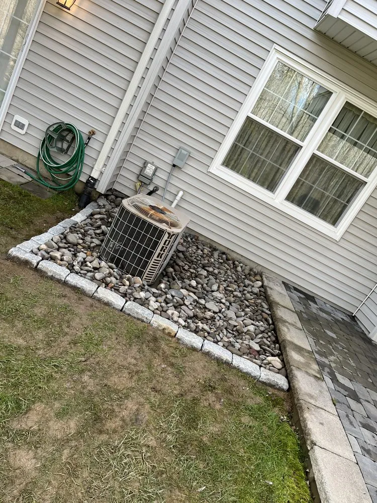 Expert lawn mowing service with custom design in Upper Chichester, PA by C. Chalker & Son Landscaping