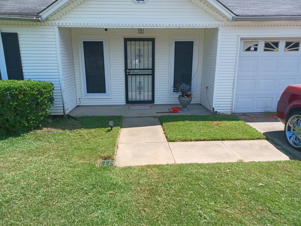 Affordable landscape design in Alexander, AR by C low's Pressure washer and lawn