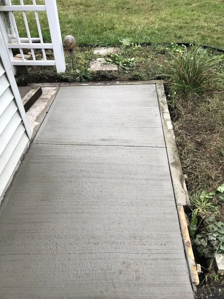 Custom landscape installation for beautiful yards in Rockford, IL by C M Debonair Garden