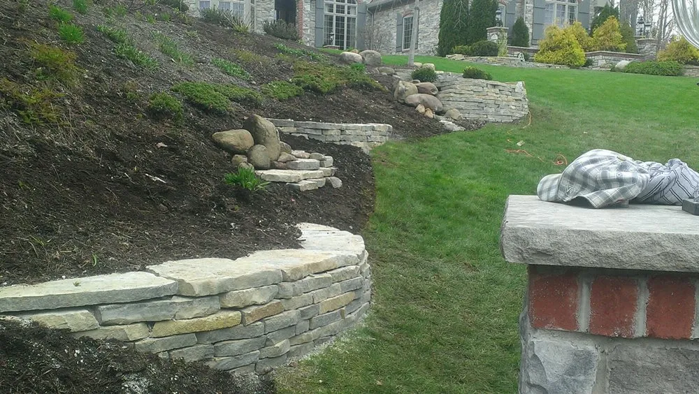 Professional lawn mowing service for residential properties in Akron, OH by C S Triola Landscaping