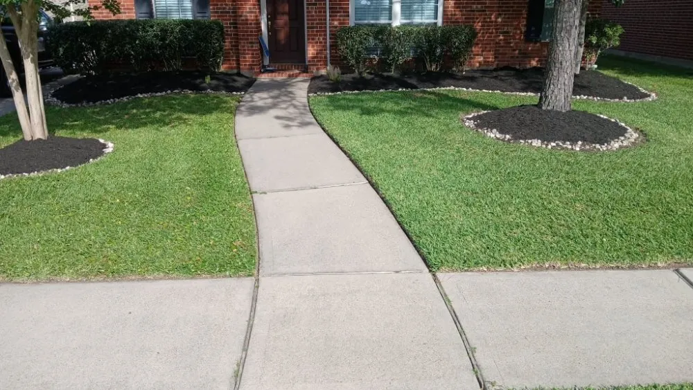 Custom landscape design for year-round maintenance in League City, TX by C W Fencing