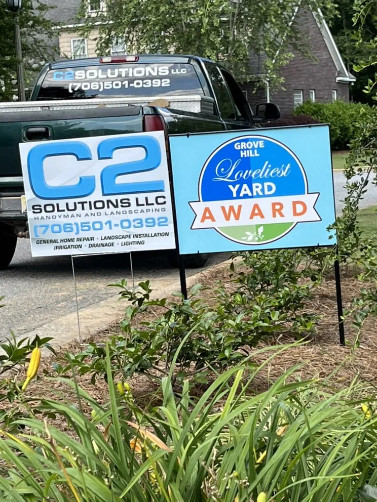 Custom outdoor landscaping for year-round maintenance in Opelika, AL by C2 Solutions