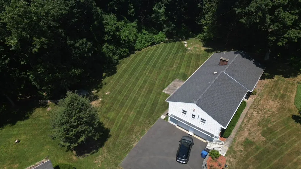 Custom lawn mowing service for homes across Trumbull, CT - CA Landscaping
