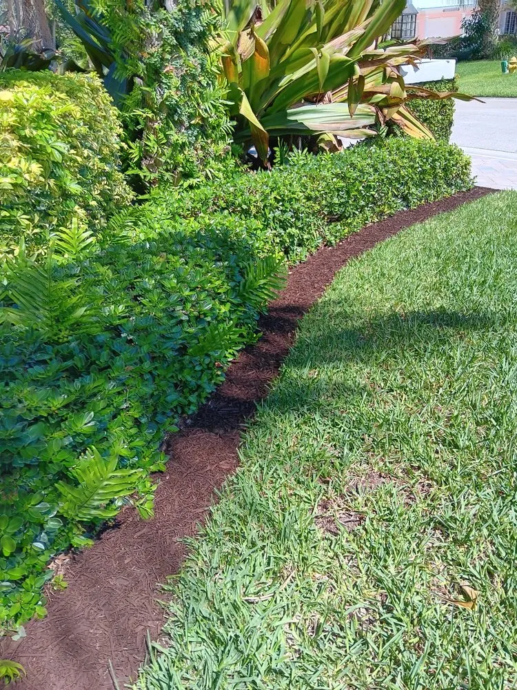 Affordable landscape installation with custom design in Fort Pierce, FL by CA Mondono Lawn Service