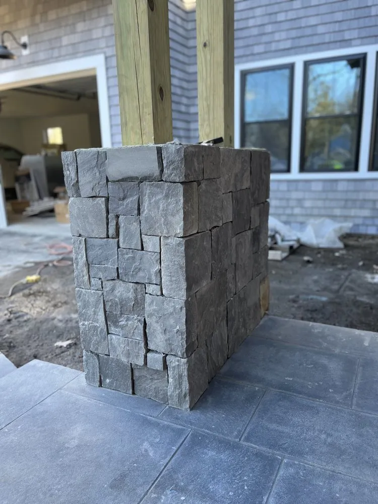 Professional outdoor landscaping with custom design in Plaistow, NH by Cabral Hardscapes