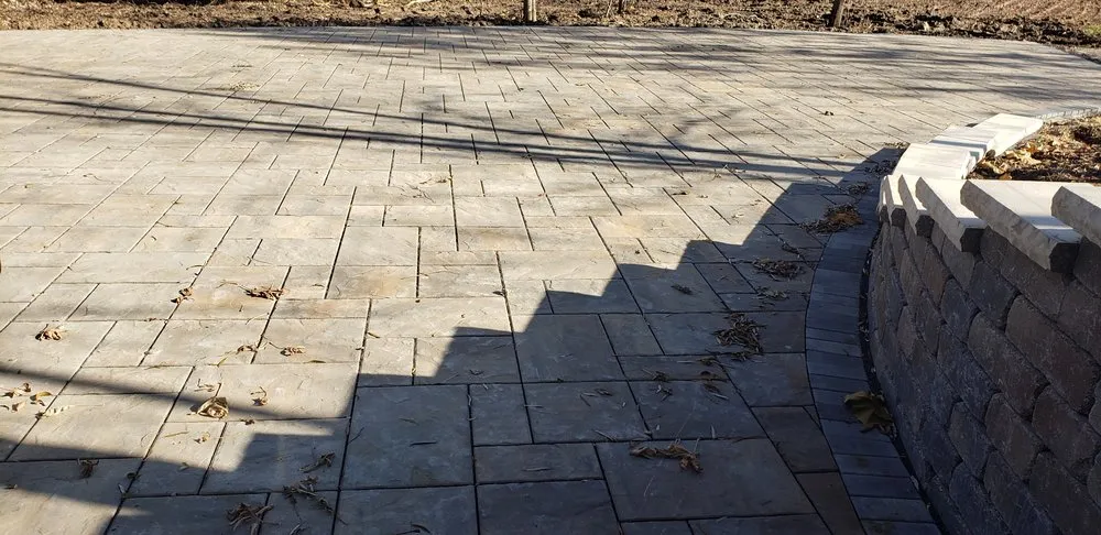 Top-rated lawn care service with custom design in Woodstock, IL by Cal and Shan's Landscape and Design