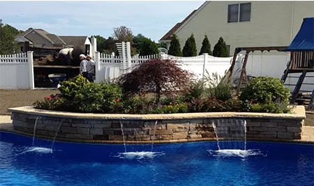 Reliable lawn mowing service for year-round maintenance across Ronkonkoma, NY - Calandro Landscape & Design