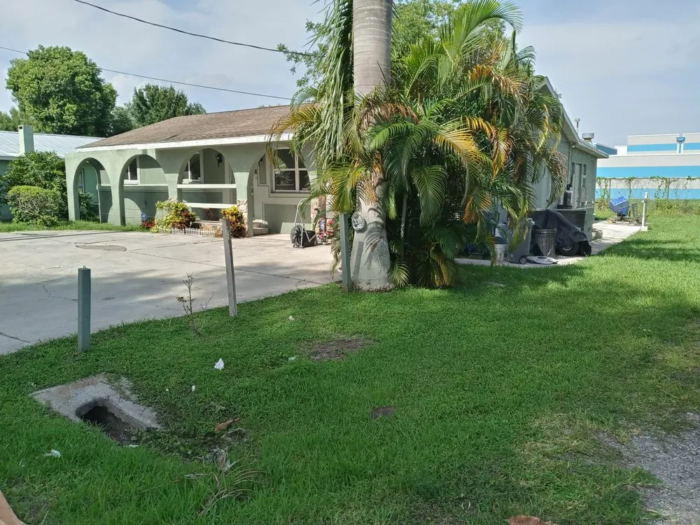 Custom outdoor landscaping with custom design in Bradenton, FL by Calhoun and Son's Lawn Care