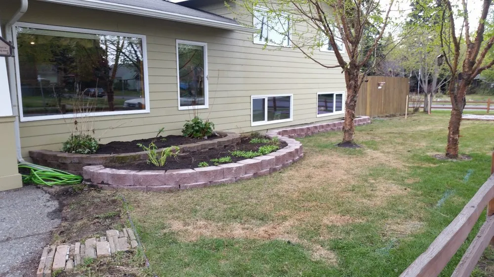 Affordable lawn mowing service for homes in Anchorage, AK by Caliber