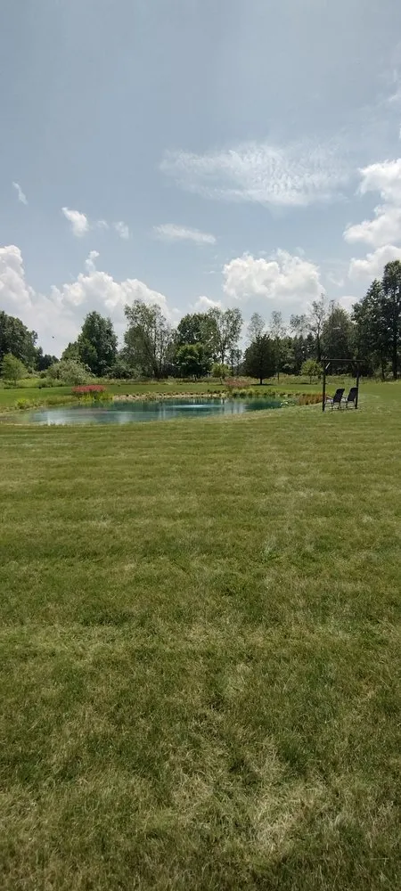 Affordable yard cleanup service with custom design across Fowlerville, MI - Call Mike