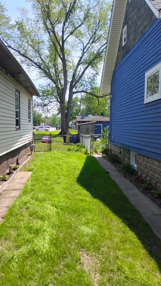 Custom landscape design for year-round maintenance in Michigan City, IN by Callahans Lawn Care and Small Handyman