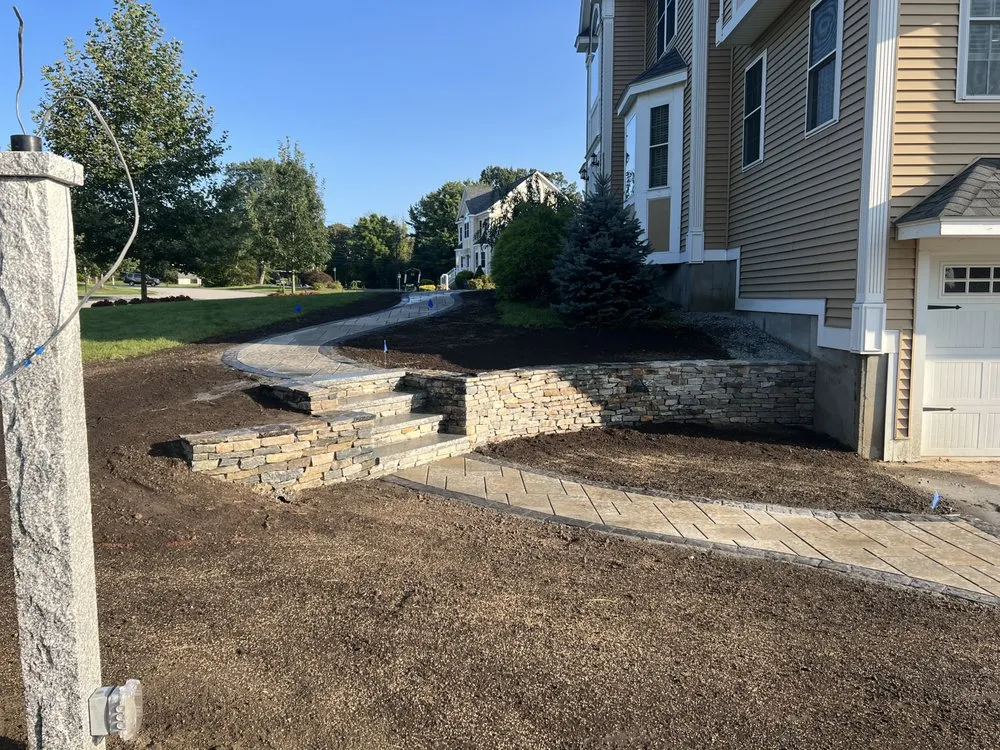 Professional yard cleanup service in Londonderry, NH by Camco Landscaping