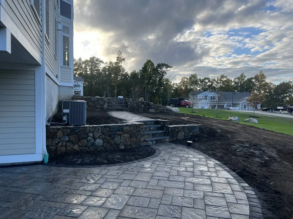 Professional yard cleanup service in Londonderry, NH by Camco Landscaping