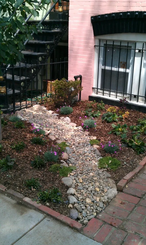 Custom outdoor landscaping for year-round maintenance in Gaithersburg, MD by Campos Landscaping & Stone