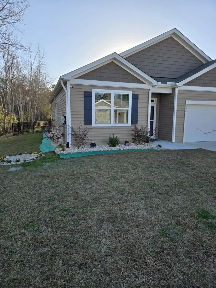 Professional yard maintenance for year-round maintenance in Wilmington, NC by Cam’s Junk Removal