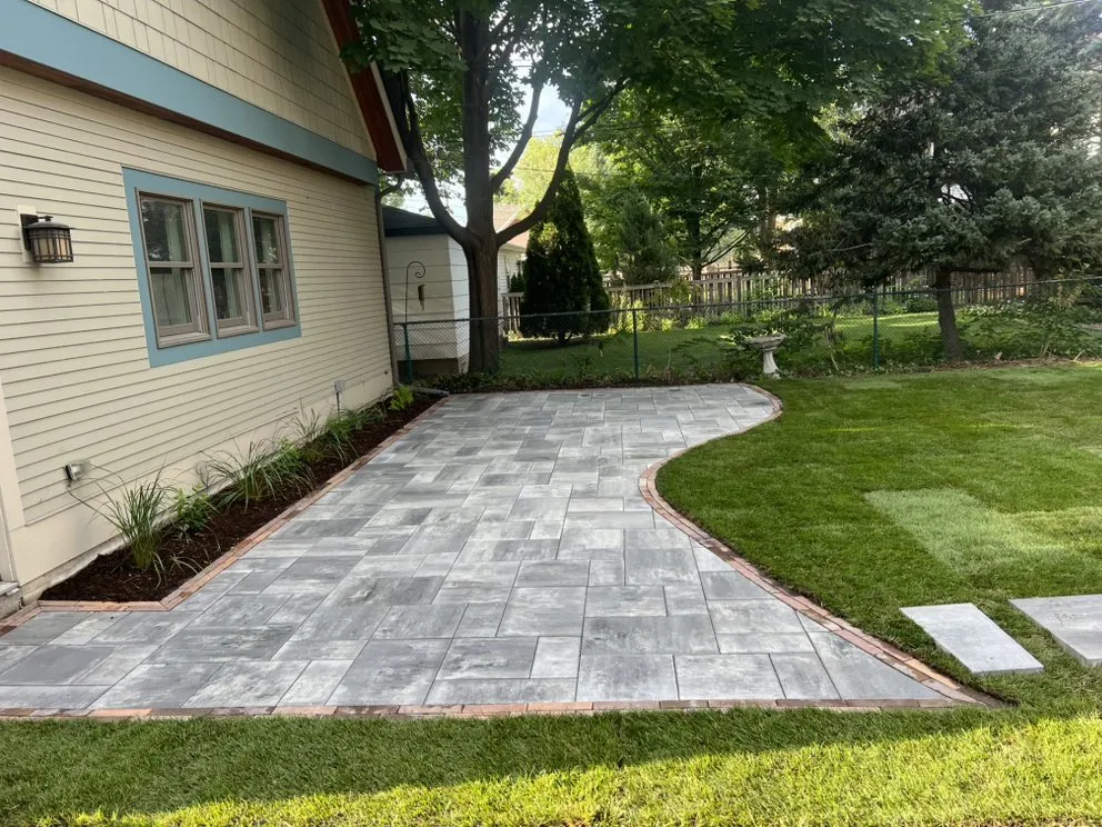 Professional landscape installation in Burbank, IL by Cande Native Landscape