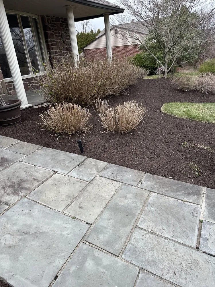 Professional yard maintenance for homes in Eagleville, PA by Candia Landscaping