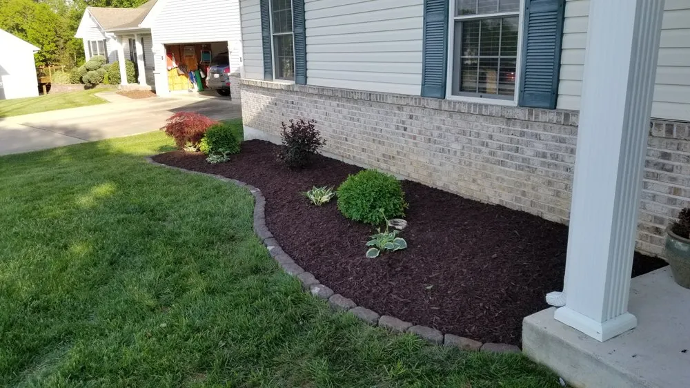 Professional lawn care service for year-round maintenance in St. Charles, MO by Candid Land Maintenance