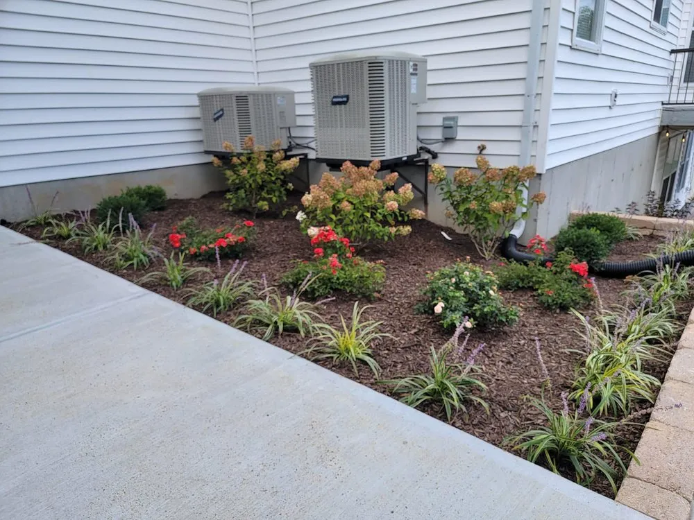 Custom garden landscaping with custom design across St. Charles, MO - Candid Land Maintenance
