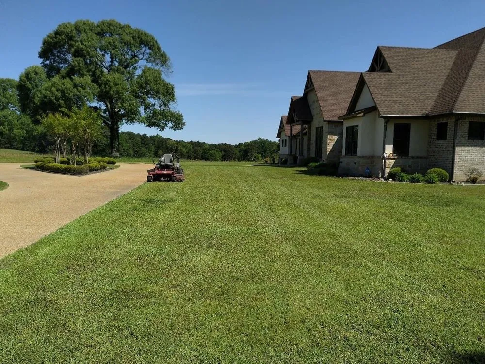 Professional garden landscaping for residential properties in Longview, TX by Canseco Lawn and Tree Service